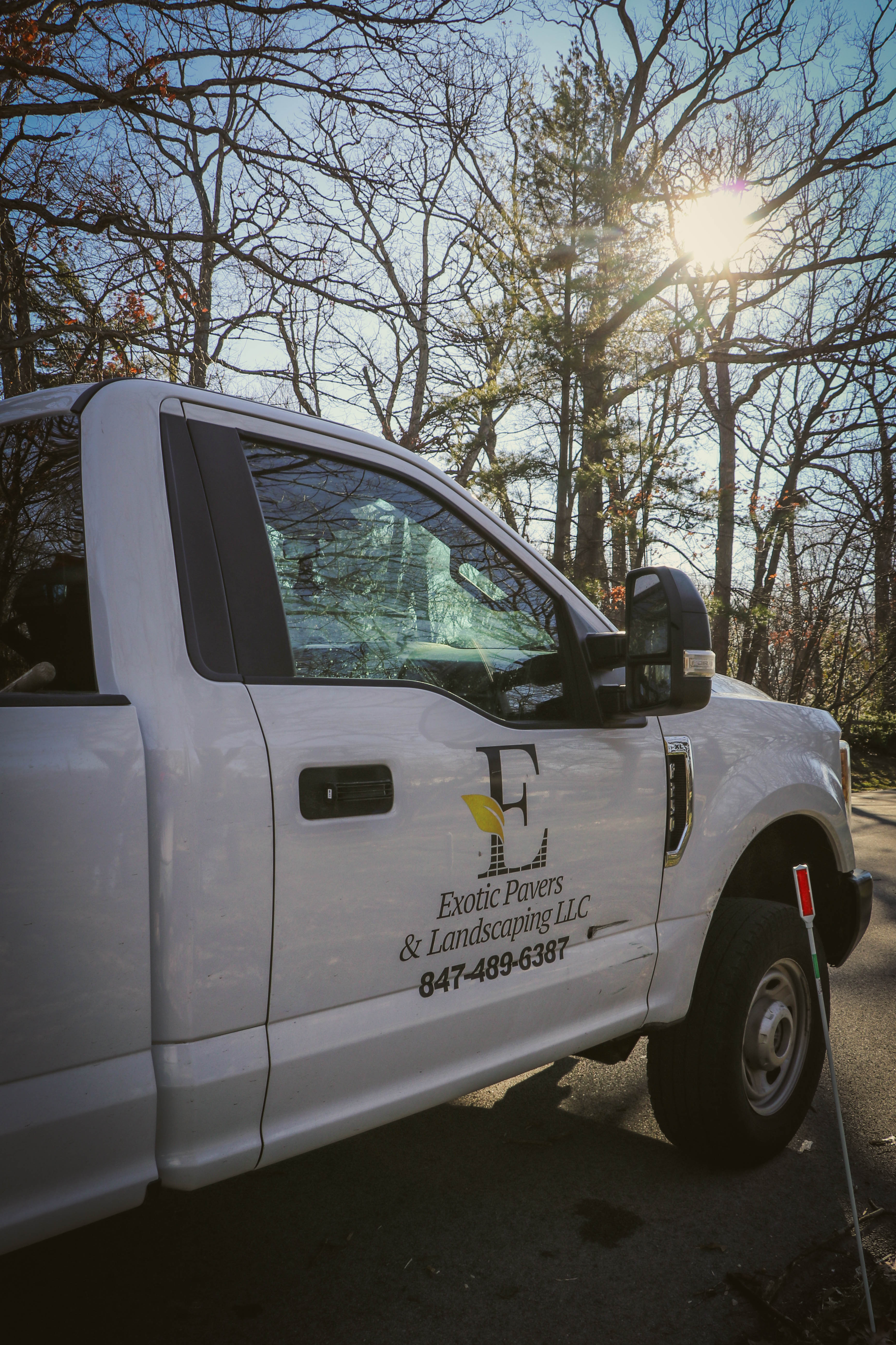 The EP&L crew truck — twenty years of yards across Chicagoland.